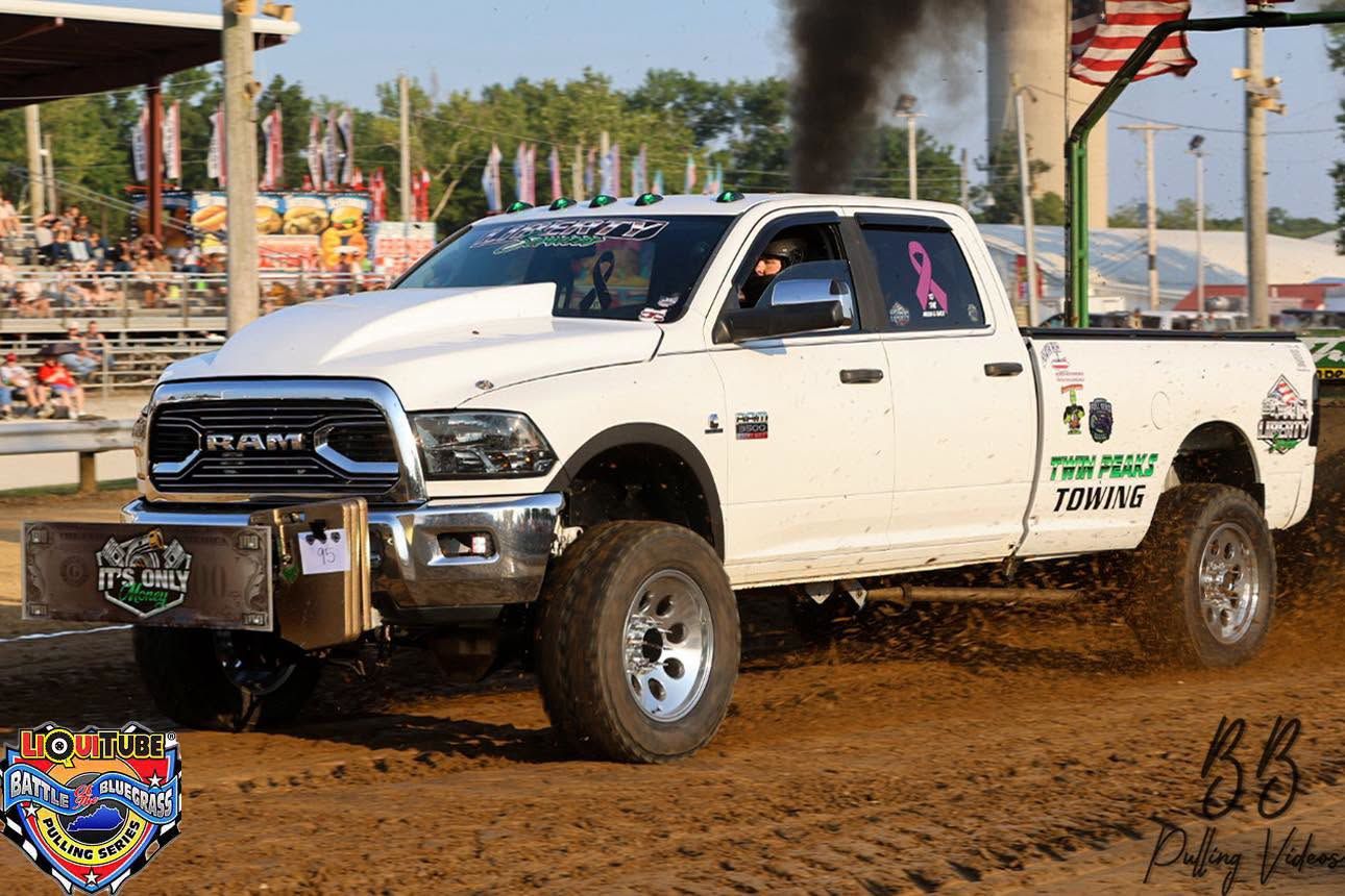 Liberty Diesel pull truck under full load on the dirt track