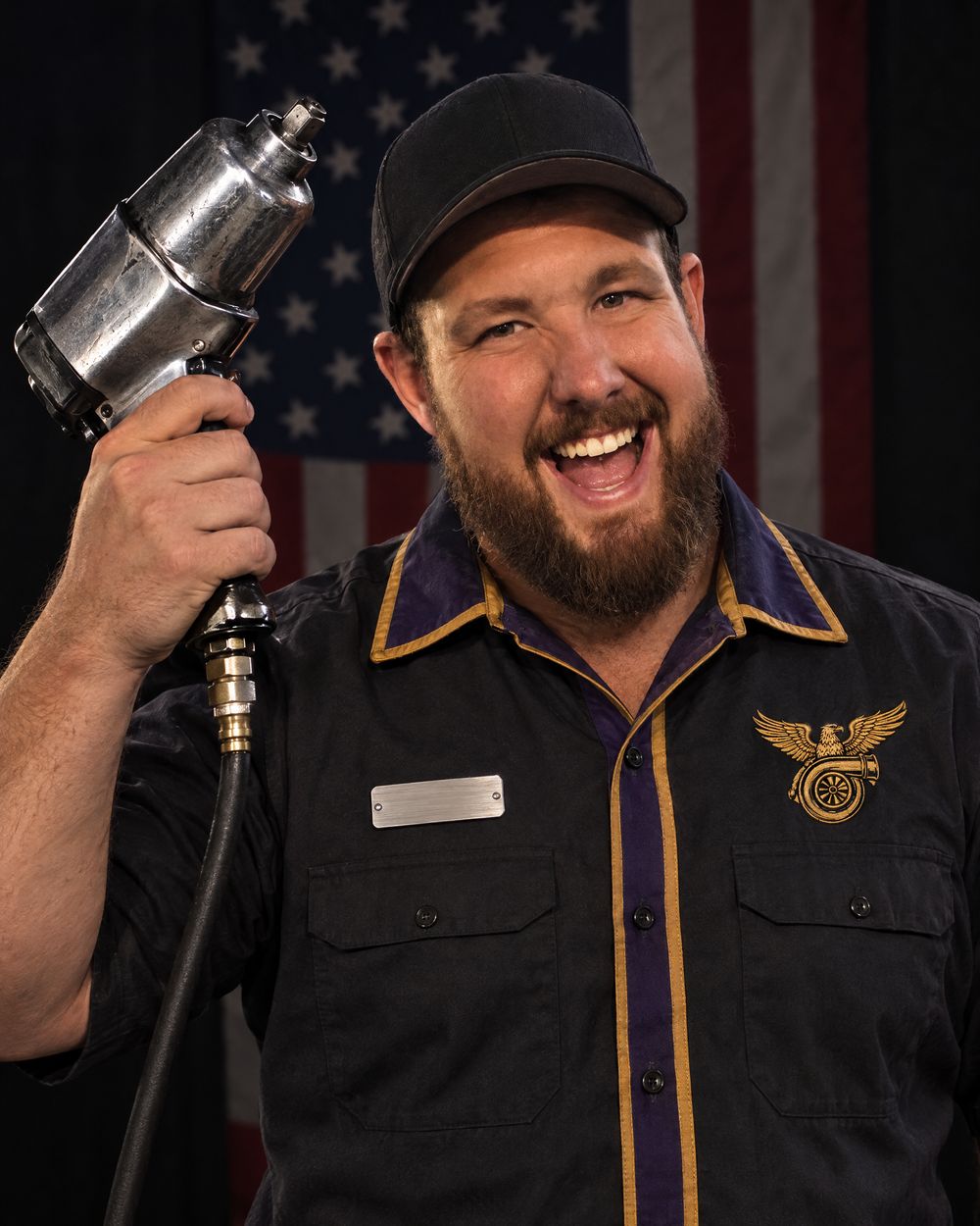 Austin Norton with an impact wrench